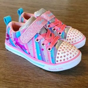 Skechers twinkle toes sz 9c. Multi color including pink, teal, gray, and purple.